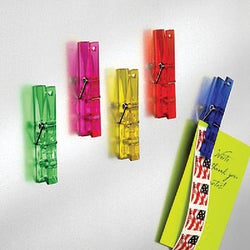 Item 601239, Brightly colored translucent clothespins hold papers, photos, and reminders